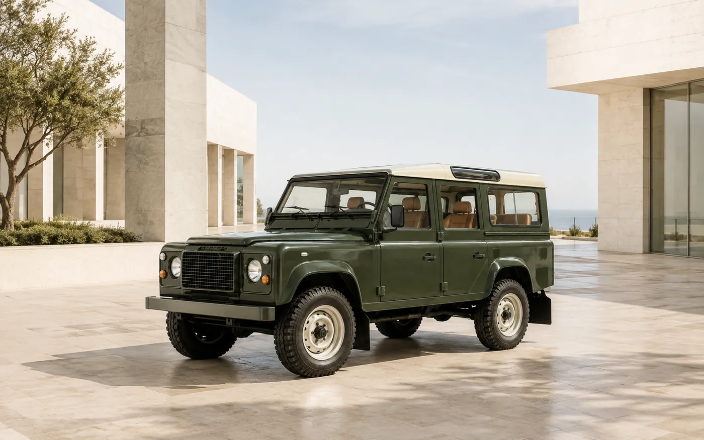 The Defender in a daylight travertine plaza